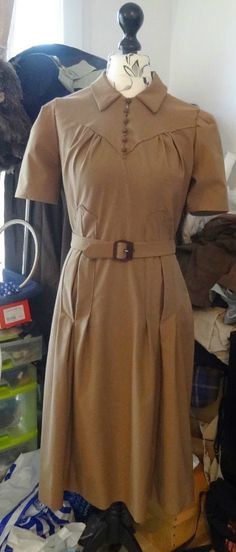 ~ Details:   Two style variation DRESS by 'Du Barry'  ~ Circa/Date: 1940s ~ Size/Measurements (Inches):     ~ Size: 20     ~ BUST: 38″     ~ Waist:  32″     ~ Hip: 41″ ~ Please Note: ~ You are buying a 'Professional Reproduced' copy of this sewing pattern. Copied from the original sewing pattern. Produced in Full Scale Pattern Pieces ready to cut with full instructions included. Reproduced on high quality 50 gm paper with black ink, durable and easier for reuse. Printed by a Professional Printing Company.   ~ With this product comes an accompanying 'Booklet' and inside the Booklet it includes: ~ A 2-page Instructions and Illustrations on 'How to Adjust Your pattern to your Personal Measurement.' ~ Personal Measurement Chart ~ Body Form Illustrations ~ Fitting Checklist ~ Metric Equivalency 1940s Utility Dress, 19402 Dress, 1940s Tea Dress Pattern Simplicity, 1940’s Winter Dress, Forties Fashion, Super Pictures, 1940s Outfits, Sew In Weave, Fashionable Accessories