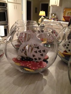 a bowl filled with cards sitting on top of a counter