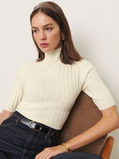 Layer up. Shop the Margoax Regenerative Merino Mock Neck Sweater from Reformation, a short-sleeve sweater with a mock neckline and ribbing throughout. Mock Neck Top Outfit Layered, Sweater Over Turtleneck, Mock Neck Sweater Outfit, Mock Neck Top Outfit, Mockneck Longsleeve, Reformation Top, Work Sweater, 2024 Wardrobe, Fashion Expression