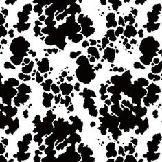 an abstract black and white background with lots of small spots on the side of it