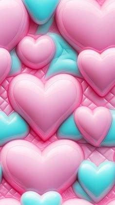 many pink and blue hearts are arranged together