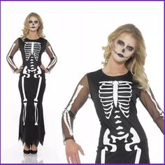 a woman in skeleton costume posing for the camera