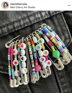 a bunch of colorful beads and clips on a person's back pocket with an instagram