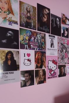 a pink wall with many pictures on it and a hello kitty sticker in the middle