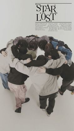 a group of people standing in a circle with their arms around each other and the words star lost above them