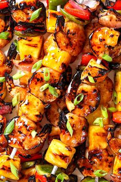 chicken and vegetable kabobs on skewers with sauce