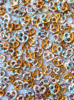 an assortment of pretzels with sprinkles on them