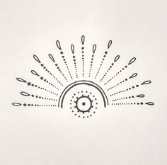 a drawing of a sunburst in black and white