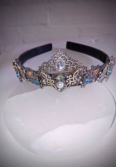 This STUNNING handcrafted bejeweled headband is so cute, unique and eyecatching 😍 Made up of beautiful silver and moonstone stones   One of a kind 🤩   Perfect for so many occasions, be it weddings, (bride bridesmaids or guests prom, festivals or any other celebration!  Or for a GORGEOUS memorable and eyecatching everyday look   Go to   www.etsy.com/uk/shop/Athenaheaddresses   to buy and check out my other creations!!. Headband Crown, Moonstone Stone, Crown Headband, Turban Headbands, Baroque Fashion, Hair Accessories Headbands, Uk Shop, Everyday Look, Moonstone