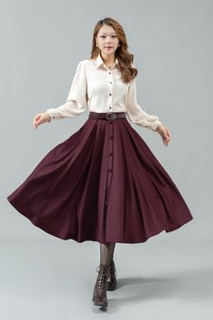 ★★ Welcome to my Ylistyle's shop！！！ This womens burgundy midi high waist swing wool skirt decorated with buttons, can be customized to your size.   It's a great gift for mom or friend.  Our long pleat swing circle wool skirt, it looks simple and elegant. ★★FEATURES 25% wool, other fiber,nylon Polyester lining Two Side pockets Right zipper closure Elastic waist at back Midi skirt, Wool circle skirt Button down skirt Autumn winter wool skirt Dry clean Belt not for sale ★★ More color from Color4 of Elegant Fall Skirt With Buttons, Elegant Winter Skirt With Button Closure, Long Skirt With Button Closure For Fall, Elegant Winter Skirt With Buttons, Fall Workwear Skirt With Button Cuffs, Elegant Full Skirt With Buttons, Fall A-line Skirt With Buttons, Purple Skirt For Workwear In Fall, Brown Buttoned Skirt For Winter