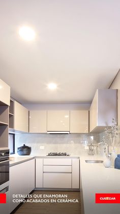 the kitchen is clean and ready to be used as a living room or dining area