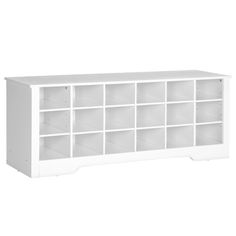 a white bookcase with many compartments on the top and bottom shelves, all in different sizes