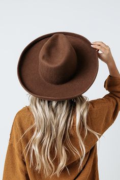 There is no better way to top off your look in the winter than with our charming mocha hued 'Chasing Wanderlust' fedora featuring lightweight wool material and a curved 4-inch brim! Hat Dimensions Length: 15.5 inches Width: 14 inches Height: 5 inches Cranial Circumference: 22 inches Thigh High Suede Boots, Wool Fedora, Model Fits, Brim Hat, In The Winter, Women Clothing Boutique, Cozy Sweaters, Thigh Highs, Online Womens Clothing