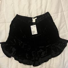 Black Velvet Ruffle Shorts With Pockets! Chic H&m Shorts, Chic H&m Short Bottoms, Chic Short Bottoms By H&m, Flirty Black Ruffled Bottoms, H&m Summer Party Bottoms, H&m Black Summer Bottoms, H&m Black Bottoms For Summer, H&m Party Bottoms For Summer, Black High-waisted Ruffled Shorts