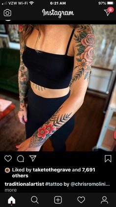 a woman with tattoos on her arms and arm