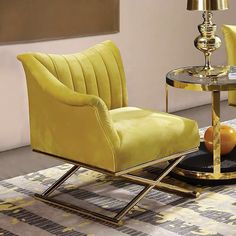 a living room with two chairs and a table that has an orange ball on it