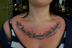 a woman with a tattoo on her chest