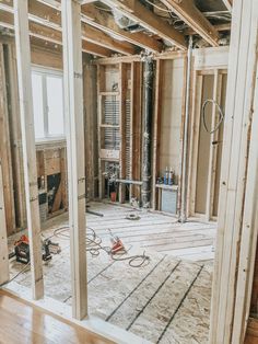 the interior of a house being built with wood framing and walls in place for insulation