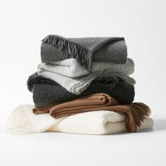 stack of folded blankets on top of each other