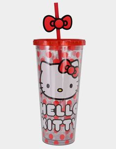 a hello kitty cup with a straw sticking out of it's lid and the words hello kitty on it