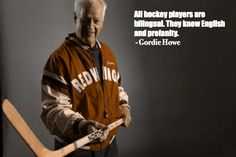 an older man holding a baseball bat and wearing a jacket with the words, all hockey players are bilingual they know english and probably