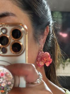 Real carnation earrings - crafted from preserved, dried, red and white carnation encased in resin, adorned with gold-plated steel ear clip. Handmade with love, using high-quality resin. Measuring 2 inches in length and 1-2 inches in width, each carnation carries a unique touch as they are made from real carnation flowers. Experience timeless elegance with these captivating earrings. Perfect for adding a touch of nature to any outfit. REMINDERS: *The colors and shapes of each carnation might be slightly different as they are made of real  flowers.This is a precious item that deserves your utmost attention. It's delicate nature requires your gentle care and handling. *These flowers have a protective resin coating that makes them durable and suitable for daily use. However, please handle them Carnation Jewelry, Rose Gold Pressed Flower Earrings, Pink Clip-on Flower Earrings For Gift, Flower Resin Jewelry, Pink Carnations, Carnation Flower, Jewelry Essentials, Earring Crafts, Jewelry Lookbook