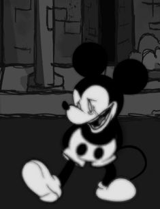 a black and white image of a mickey mouse