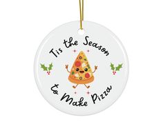 a christmas ornament that says tis the season and make pizzas on it