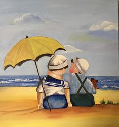 two people sitting on the beach under an umbrella