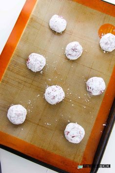 some cookies are sitting on a baking sheet