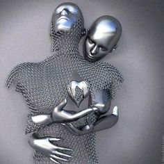 two silver metal figures hugging each other