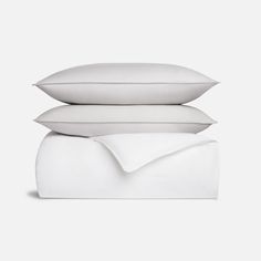 three pillows stacked on top of each other