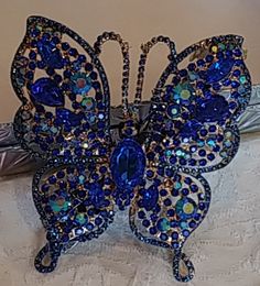 Dark Blue & Lake Blue & AB Crystal Rhinestone CZ Gold Butterfly French Hair Barrette Jewelry Clip Beautiful Bodacious Barrettes make us feel pretty. They are jewelry for our hair.    This was a Betsey Johnson Brooch.  I removed the pin connection and painstakingly wired the piece to a 3-inch french barrette.   The photos do not do justice to the superb quality and sparkle of the crystals and rhinestones.  All of my barrettes come with a 100% money-back guarantee; however, this does NOT include s Santa Bags, French Hair, French Barrette, Blue Lake, Star Work, Feel Pretty, Gold Butterfly, Pink Crystal, Hair Barrettes