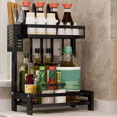 a bathroom shelf filled with bottles and spices