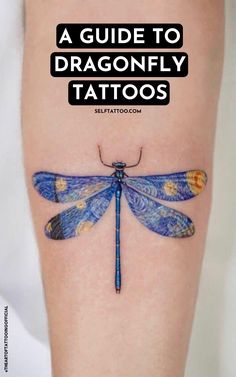 a blue dragonfly tattoo with the words a guide to dragonfly tattoos on it