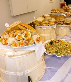 a buffet table filled with lots of food