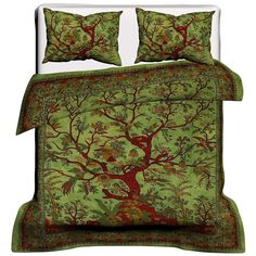 an image of a bed with green and red bedspread set on top of it