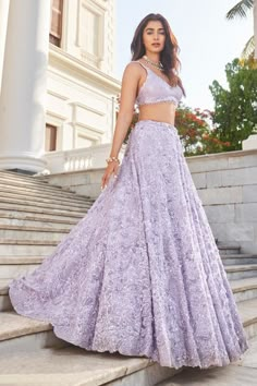 Purple lehenga featuring all-over tonal sequin floral embroidery and cutwork detail on the hem. Paired with an embroidered sleeveless padded blouse and a dupatta with floral embroidered cutwork border and fringe detailing., Fit: Relaxed Mauve Lehenga, Floral Bridal Lehenga, Sequin Lehenga, Seema Gujral, Purple Lehenga, Chic Prom Dresses, Neo Pop, Sangeet Outfit, Net Embroidery