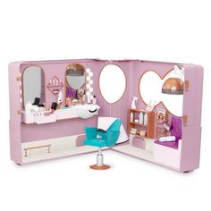 a doll house with furniture and mirrors