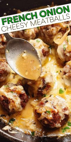 a skillet filled with meatballs covered in cheese and gravy, topped with a spoon