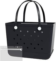 a large black bag with holes in the front and bottom, sitting on a white background