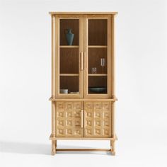 a wooden cabinet with glass doors and drawers