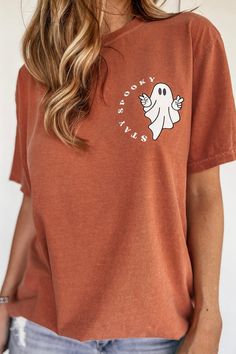 "Say "Boo!" to boring basics with this Stay Spooky Tee in Vintage Orange! Featuring a cute ghost giving peace signs, this tee will keep your look spooktacularly stylish – no haunting required! 🧛‍♀️" Look fabulous oversized but is true to size. Unisex sizing. Printed on a super comfy unisex Comfort Colors tee Stay Spooky, Layered Sweater, Peace Signs, Aesthetic Shirts, Vintage Orange, Comfort Colors Tee, Halloween Tees, Cute Ghost, Vintage Halloween