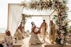 the bride and groom are getting ready to walk down the aisle at their wedding ceremony