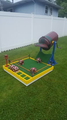 an inflatable game set up on the lawn for kids to play games with