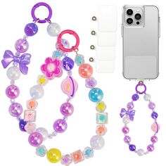 a cell phone is next to an assortment of bracelets and beads on a white background