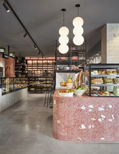 the inside of a restaurant with lots of food