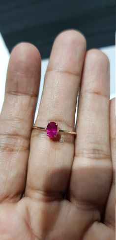 14k solid yellow gold 6x4 mm natural ruby precious gemstone ring. 1. The weight of the natural ruby precious gemstone used in the ring =0.56 cts. 2. The weight of the 14k solid yellow gold used in the ring=0.840 gms. The ruby is the birthstone for the people born in the month of July. This is absolutely gorgeous ring. I am pretty confident that my work will be appreciated. Thanks. Oval Ruby Birthstone Ring In Fine Jewelry Style, Oval Ruby Birthstone Ring Fine Jewelry, Dainty Oval Ruby Ring For Formal Occasions, Oval Ruby Ring For Formal Occasions, Oval Yellow Gold Ruby Ring With Birthstone, Oval Ruby Ring With Prong Setting, Oval Solitaire Ruby Ring, Fine Jewelry Oval Solitaire Ruby Ring, Oval Yellow Gold Ruby Ring