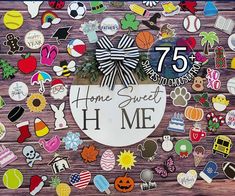 a bunch of stickers that are on top of a wooden board with the words home sweet h me