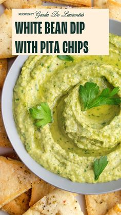 white bean dip with pita chips on the side